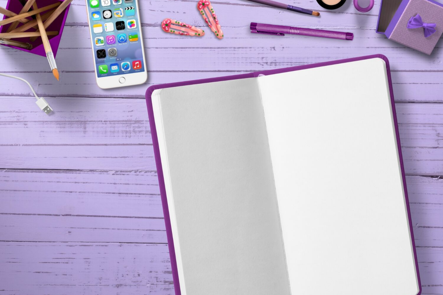 Purple desk with girls' diary and phone
